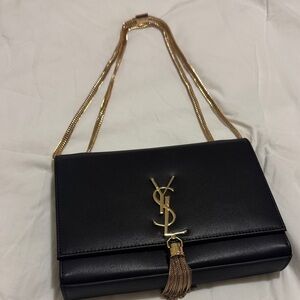 Yves Saint Laurent Black Clutch with Gold Tassel Chain